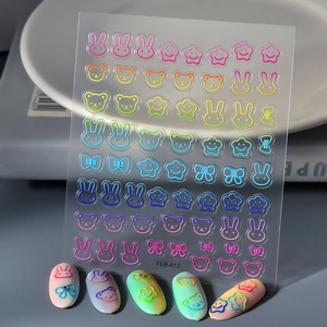 Detail view of 5D gradient bear nail stickers with embossed rabbit and star patterns