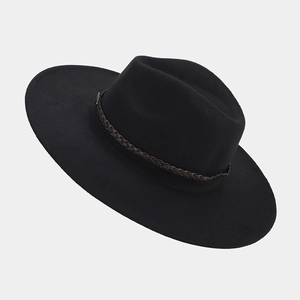 Detail of black wide brim fedora hat with brown braided leather band and metal buckle