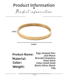 Detail showing 6mm gold stainless steel oval bangle with engraved star and moon patterns