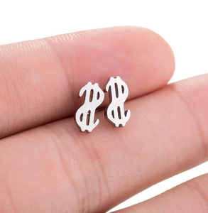 Close-up of mini dollar sign stud earrings in brushed silver stainless steel