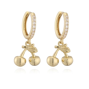 Close-up of golden cherry hoop earrings with sparkling cubic zirconia pavé stones