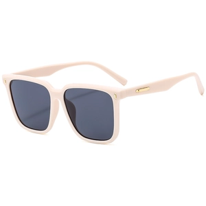 Square oversized sunglasses in beige tea frame with dark lenses and gold accents