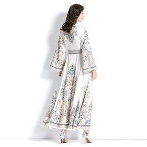 Bohemian paisley print maxi dress with flare sleeves and high waist floral pattern