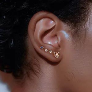 Detailed macro view of S925 silver stud earring set with colorful heart zircon stones