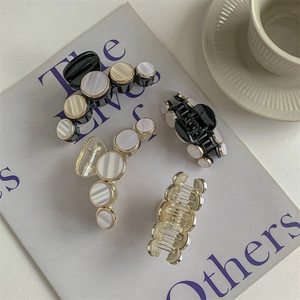 Elegant shell texture hair claw clips in black and transparent sets for women's updos