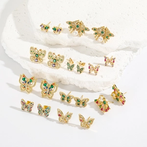 Exquisite gold-plated butterfly and bee stud earrings with colorful crystals on white stone