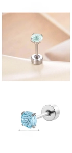 Detail of 4mm light blue zircon ear stud with four-claw setting and flat back screw