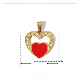 Detail of red enamel heart tree pendant showing 28mm by 21mm size dimensions