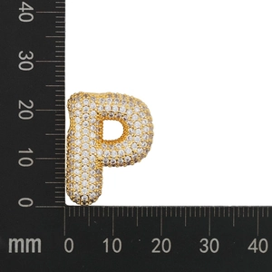 Macro shot of Zircon-encrusted letter P pendant on scale ruler showing 25mm height