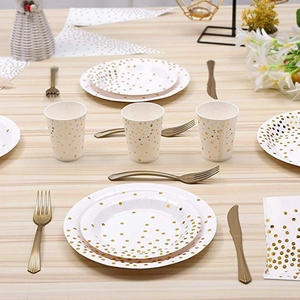 White and gold dot disposable party dinnerware set with plates, cups, and napkins