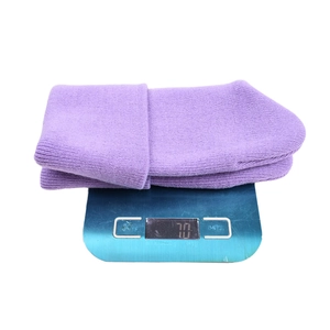 Solid purple knit beanie with cute ear design weighing approximately 70g on scale