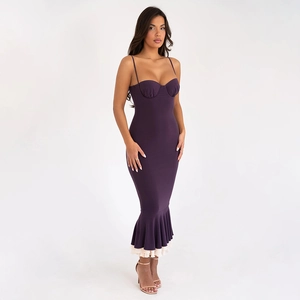 Detailed view of purple bodycon dress with elegant fishtail hem and ruffle stitching