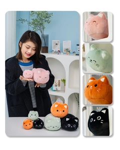 Detailed view of plush cat dolls in four colors with embroidered facial features