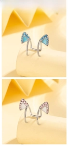Detail of cat-ear cuff earrings with blue and pink cubic zirconia for non-pierced ears