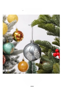 Detail of matte grey Christmas ball with silver pinecone glitter pattern for tree decor