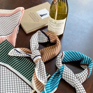 Elegant 70cm geometric lattice silk-like scarf set displayed on a dark wooden table background