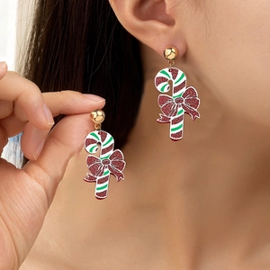 Boucles d'oreilles canne de Noël avec nœuds rouges scintillants et puces dorées