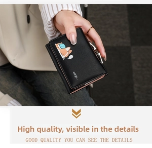 Close-up of black litchi grain tri-fold wallet with cute corgi print and metal clasp