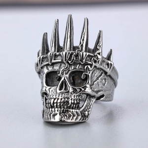 Detailed close-up of gothic skull ring with crown in vintage silver stainless steel
