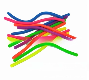 Macro shot of colorful TPR sensory noodles including blue, pink, orange, and purple hues