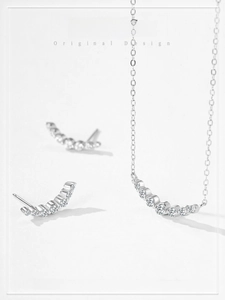 Detailed close-up of S925 silver jewelry set featuring a curved diamond smile line design