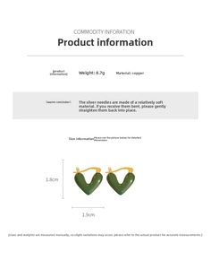 Detail view of green enamel heart earrings with size measurements and 8.7g weight info