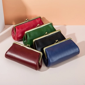 Vintage leather evening clutch bags in multiple colors with retro metal clasps