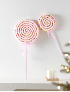 Pink lollipop Christmas ornament with colorful beads and a silk ribbon bow detail