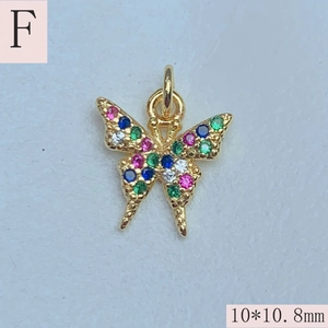 Detailed macro view of butterfly charm with colorful zircons measuring 10x10.8mm for jewelry