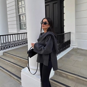 Women's dark grey loose asymmetric wool coat with matching scarf in street style