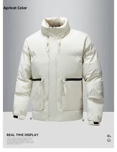 Detail of apricot winter jacket with stand collar, drawstring, and black zip pockets