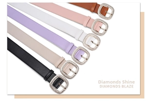 Close-up of six colorful fashion belts with sparkling rhinestone square buckles