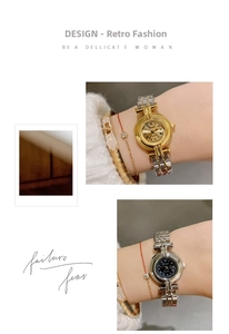 Detail view of quartz watches with Roman numeral dials and elegant steel bands