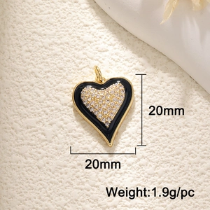 Macro view of 20mm black heart pendant with zircon accents weighing 1.9g per piece