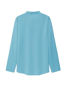 Detail view of sky blue long sleeve polo shirt showing stand collar and back design