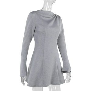 Close-up of gray long sleeve mini dress featuring slim fit cut and fine fabric texture