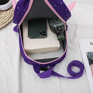 Detail view of the spacious purple galaxy backpack interior with secure nylon lining