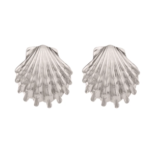 Macro detail of silver scallop shell earrings with radiant textures and wavy edges