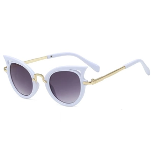 Detailed view of white cat-eye sunglasses with gold metal temples and purple gradient lenses