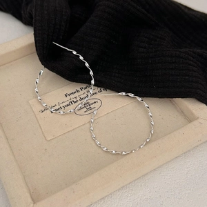 Polished S925 sterling silver twist hoop earrings with minimalist spiral design