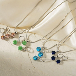 Parure de bijoux en argent avec collier et boucles d'oreilles en cristal en quatre couleurs