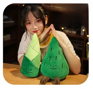 Detailed view of plush bamboo shoot toys with cute embroidered faces and soft textures