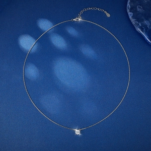 Detail shot of the S925 sterling silver clasp and adjustable chain with tiny round zircon
