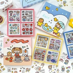 Flat lay of colorful cartoon sticker gift sets featuring cute girl and fruit themes