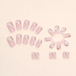 French style press-on nails with silver glitter, white lines and heart patterns