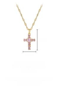 Detail showing pink zircon cross pendant dimensions 2.6cm by 1.4cm on gold chain