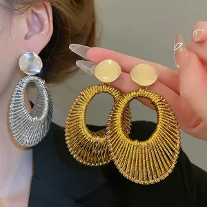 Boucles d'oreilles créoles ovales tissées pour femmes en fini or et argent