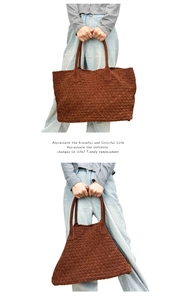 Detail of dark brown suede leather woven tote bag showing texture and slouchy shape