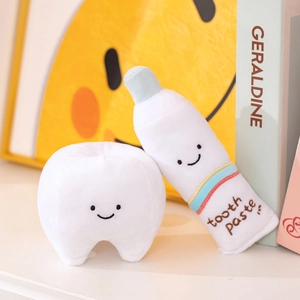 Cute soft plush toy set featuring a white tooth doll and a rainbow toothpaste character