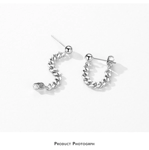 Detail of S925 sterling silver chain earrings showing S925 hallmark on the stud